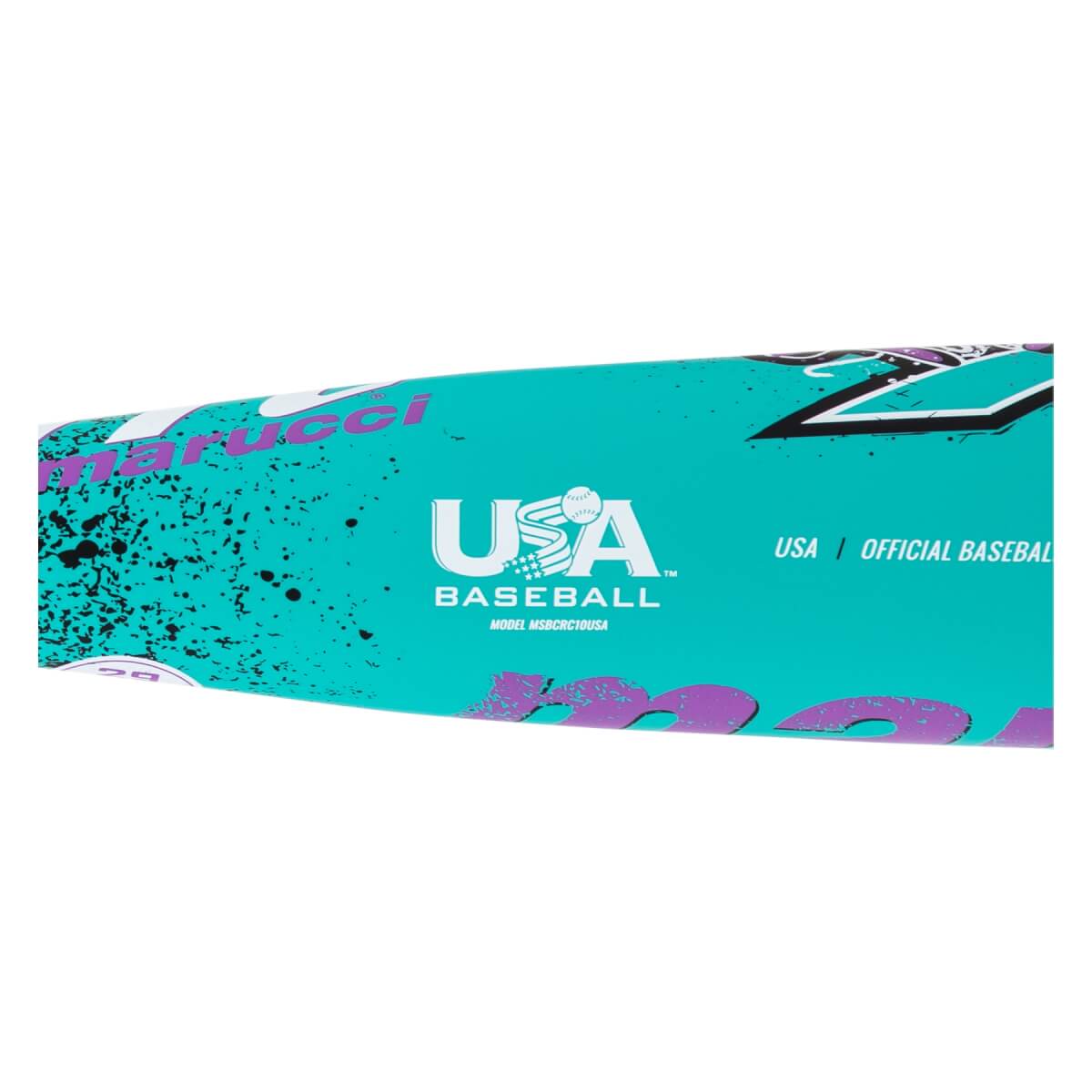 Close-up of a turquoise baseball bat with white Marucci branding, a prominent USA Baseball logo, and black splatter pattern.