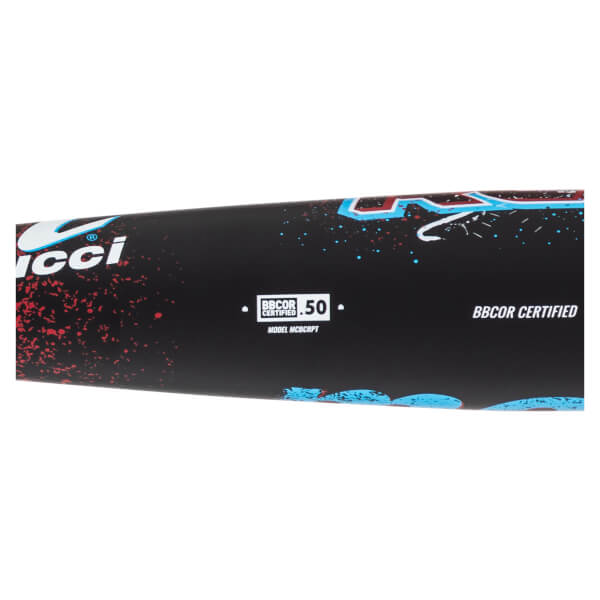 Close-up of the black barrel with red and blue splatter, showing the Marucci logo and "BBCOR CERTIFIED .50" label above "MODEL MCBCRPT."