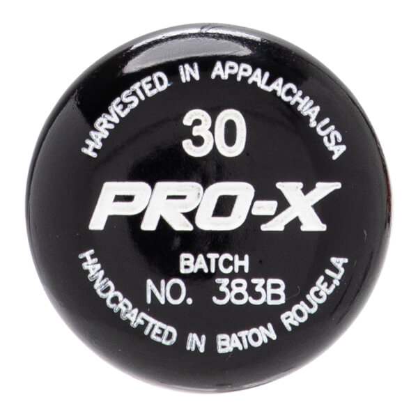 Close-up of black baseball bat end cap with white PRO-X logo, 30, and HARVESTED IN APPALACHIA, USA text.