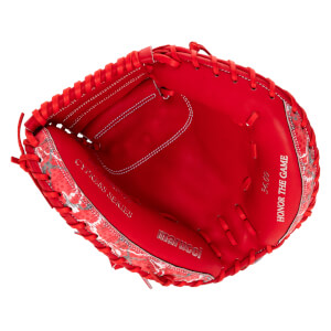 Front view of a red catcher's mitt featuring "CYPRESS SERIES," "marucci," "34.00," and "HONOR THE GAME" text on the palm with patterned red and white trim on the outer edges.