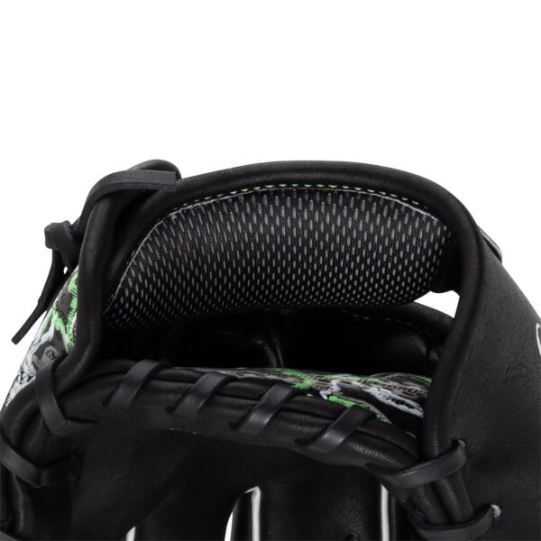 Close-up of the wrist opening featuring a grey mesh pad, black leather with lime green accents, and a graphic-patterned interior lining.