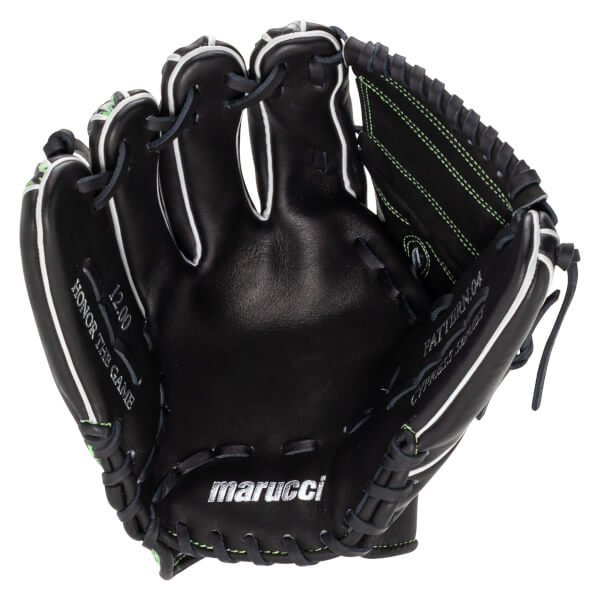 Interior palm view of a black glove with white piping and green stitching, featuring silver marucci branding and embossed HONOR THE GAME and CYPRESS SERIES text.