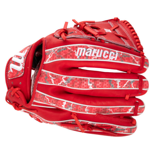 Side view of a red Marucci baseball glove with white "Marucci" lettering and a patterned insert.