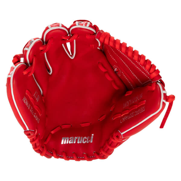 Front palm view of a red Marucci baseball glove with white trim, featuring silver 'marucci' text and 'CYPRESS SERIES' and 'HONOR THE GAME' branding on the palm.