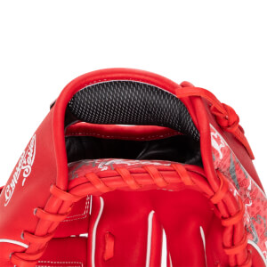 Close-up interior view of a red Marucci baseball glove with "Cypress Series" visible on the side and a black mesh lining.