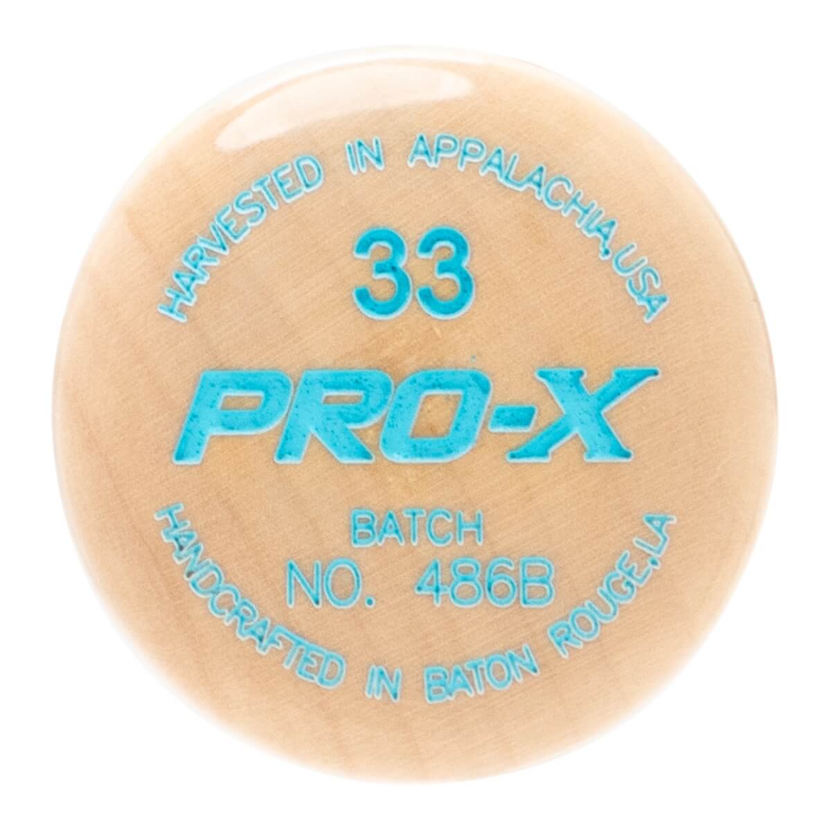 Top-down view of a light brown baseball bat end with teal 33 PRO-X text and origin details.