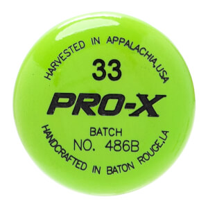 Close-up of a bright green baseball bat end cap with black PRO-X text, number 33, and origin details.