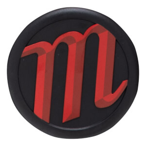 Close-up of a black circular cap with a red "m" logo.