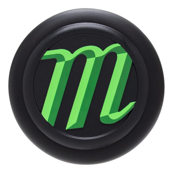 Top-down view of a black knob with a green 3D "m" logo.