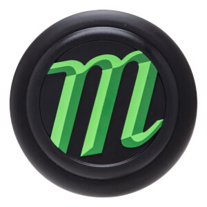 Top-down view of a black knob with a green 3D "m" logo.