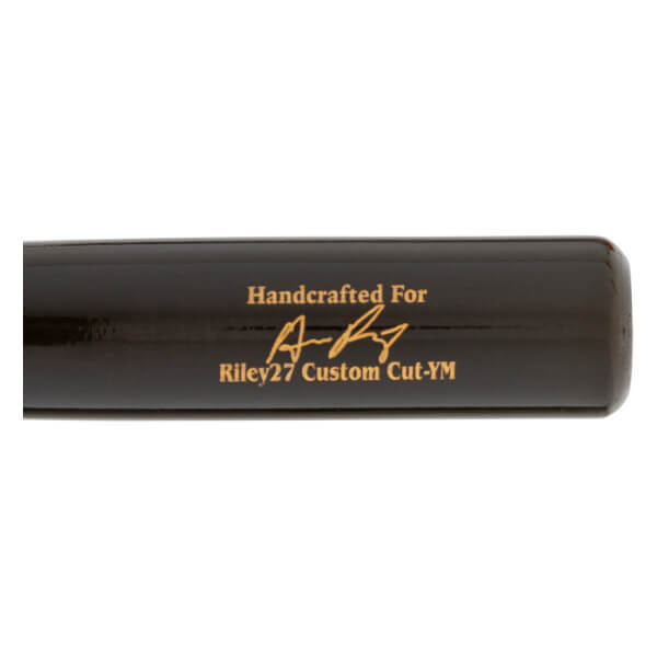Close-up of a black baseball bat with gold Handcrafted For text, a signature, and Riley27 Custom Cut-YM branding.