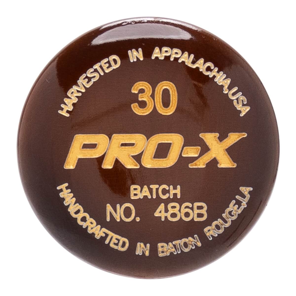 Close-up of a dark brown baseball bat end cap with gold PRO-X logo, 30, and production details.