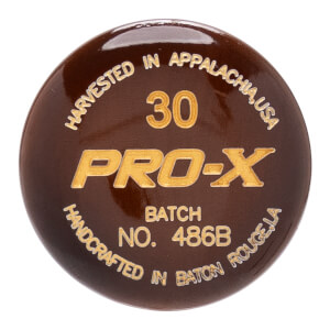 Close-up of a dark brown baseball bat end cap with gold PRO-X logo, 30, and production details.