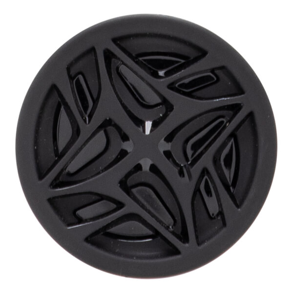 Close-up of a black bat end cap with a glossy, raised, intricate pattern and a matte outer rim.