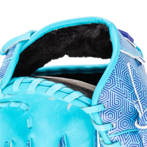 Close-up of a turquoise baseball glove with a blue geometric pattern and black lining.