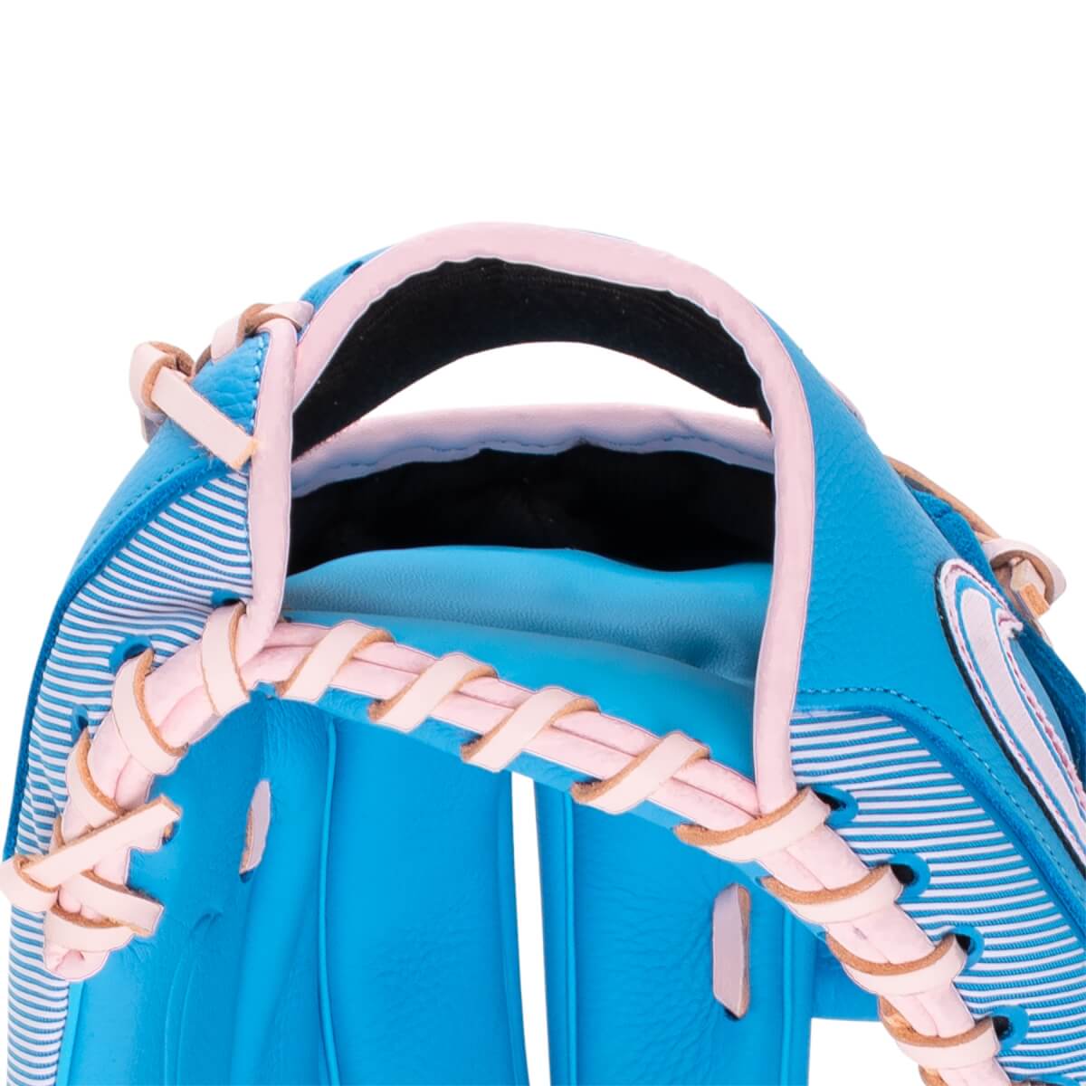Angled close-up of a blue baseball glove with pink lacing, a striped back, and a white Nike swoosh logo.
