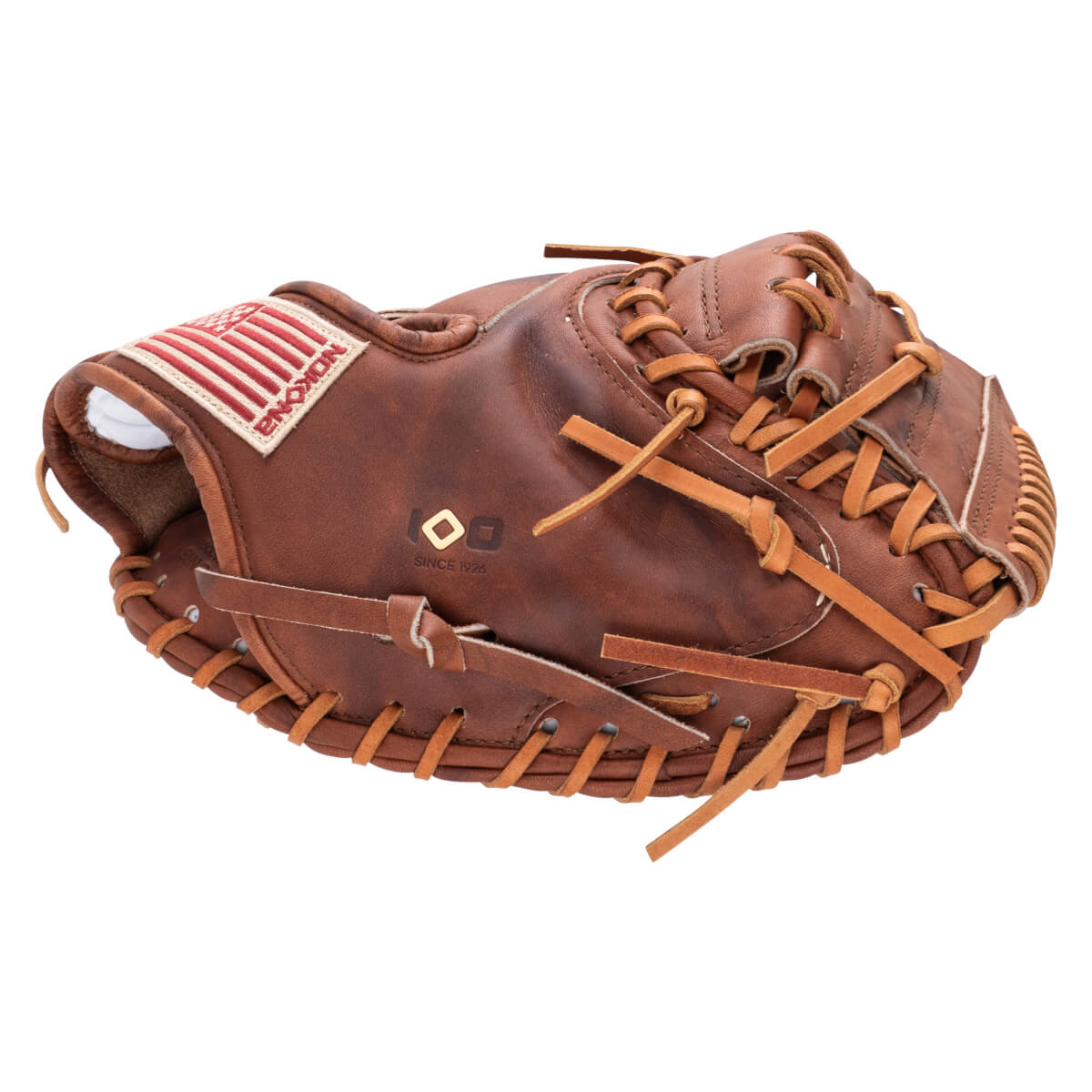 Top-down view of a brown leather baseball glove with an American flag patch and "SINCE 1926" text.
