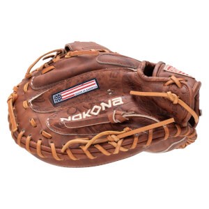 Side view of a brown leather Nokona baseball glove with "MADE IN AMERICA" flag detail.