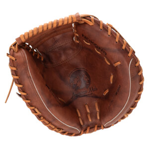Top-down view of an open brown leather baseball glove with "NOCONA" and "American Made" visible.