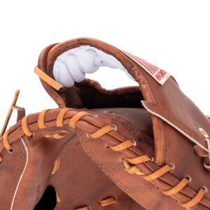 Close-up of a brown leather baseball glove showing lacing and a white interior lining.