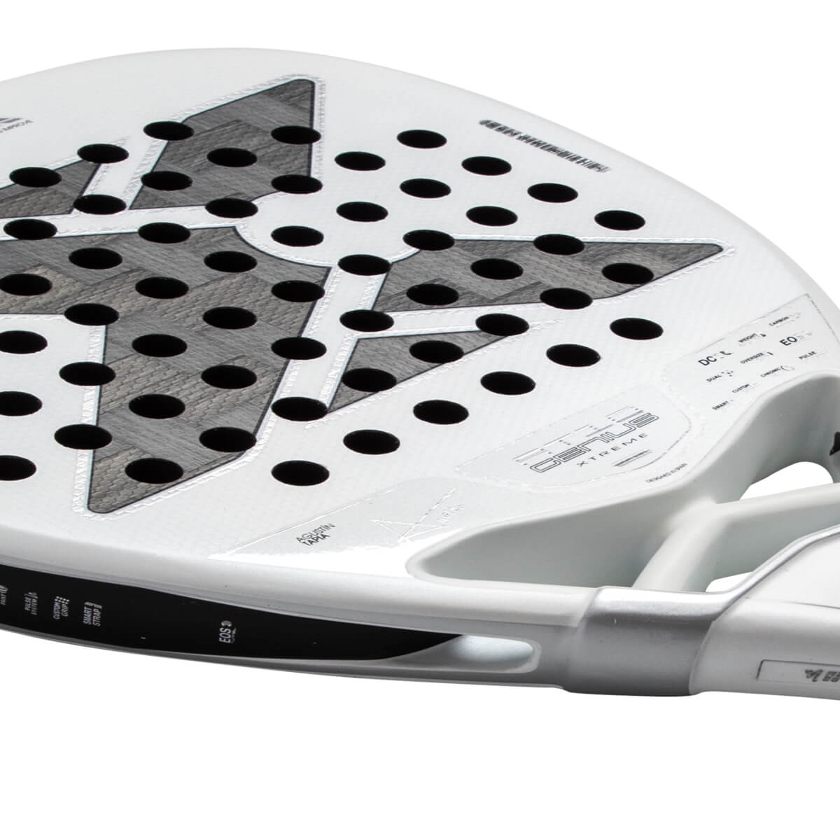Close-up perspective of a white padel racket face featuring a grey star pattern, perforated holes, and the words GENIUS XTREME and AGUSTIN TAPIA.