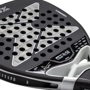 Close-up of a black and gray padel racket with a perforated face, textured carbon fiber pattern, and AT10 GENIUS branding.
