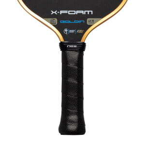 Close-up of the lower paddle face and handle, featuring the X-FOAM, GOLDIN, and NOX logos with a gold-trimmed edge and a black textured grip.