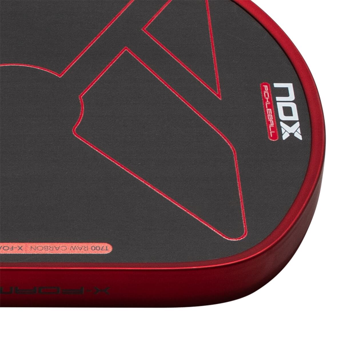 Close-up of the red-rimmed corner showing a black face with red geometric outlines, the Nox Pickleball logo, and T700 Raw Carbon text.