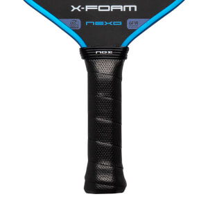 Close-up of the black perforated handle and lower paddle face featuring blue trim and labels for X-FOAM, NEXO, USA Pickleball, and UPA PRO.