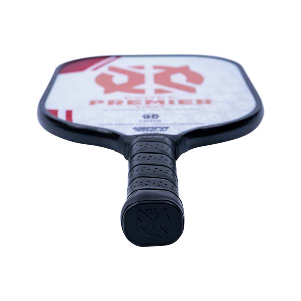 Top-down view of a white pickleball paddle with red branding and a black grip.