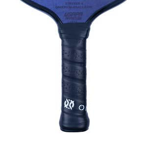 Close-up of a dark blue pickleball paddle grip with textured perforations and ONIX logo.