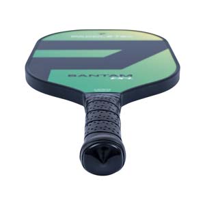 Top-down view of a green and black pickleball paddle with BANTAM EX-L text and a perforated grip.