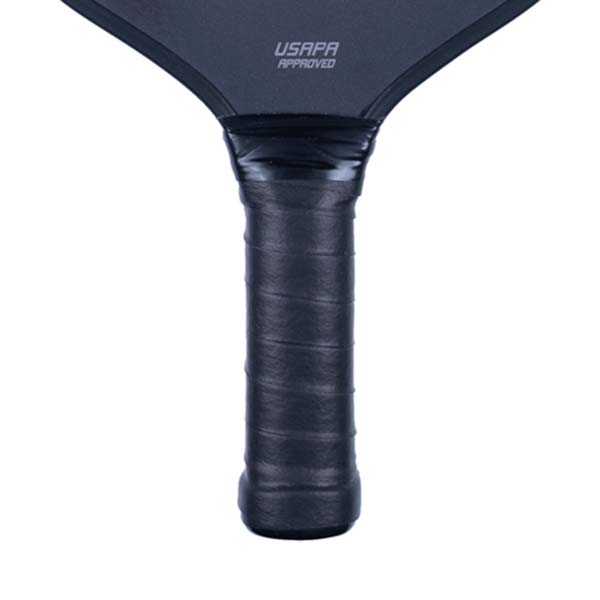 Close-up of a black pickleball paddle grip with USAPA APPROVED text.