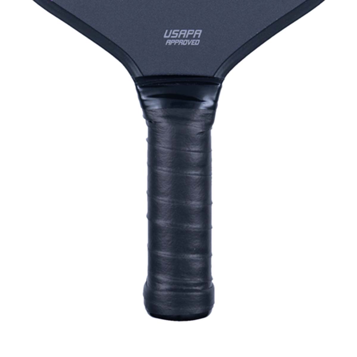 Close-up of a black pickleball paddle grip with USAPA APPROVED text on the paddle head.