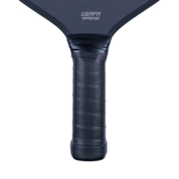 Close-up of a black pickleball paddle grip with USAPA APPROVED text.