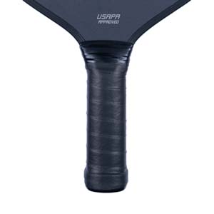 Close-up of a black pickleball paddle grip with USAPA APPROVED text.