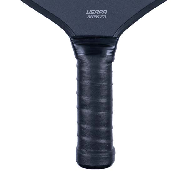 Close-up of a black pickleball paddle grip with USAPA APPROVED text.