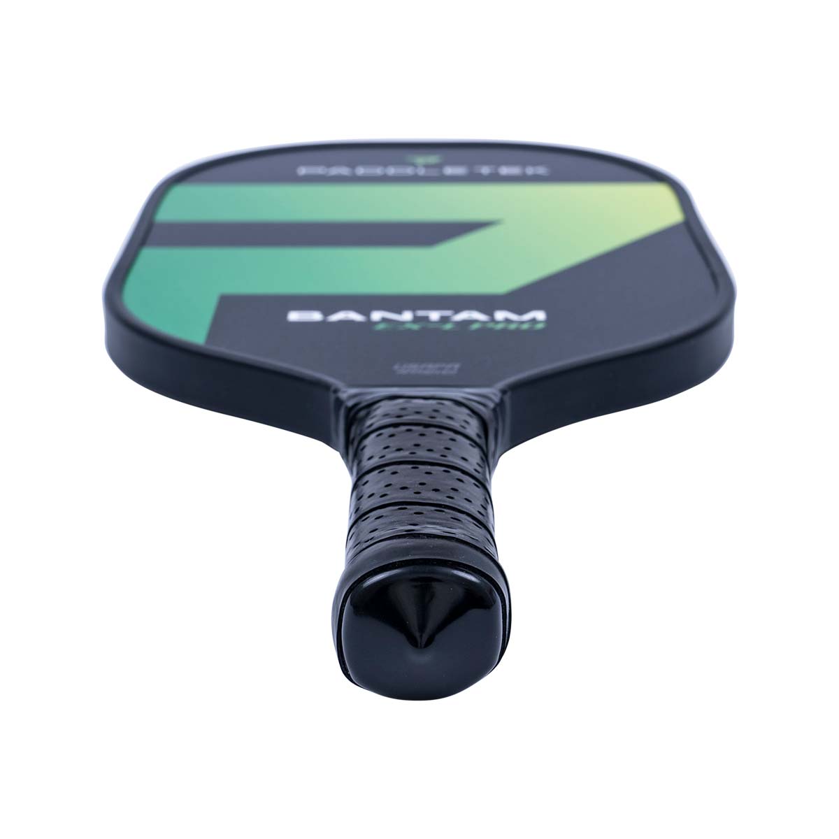 Top-down view of a black pickleball paddle with green accents and BANTAM EX-L PRO text.
