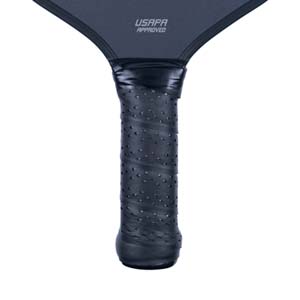 Close-up of a black pickleball paddle grip with a textured surface and USAPA APPROVED text.