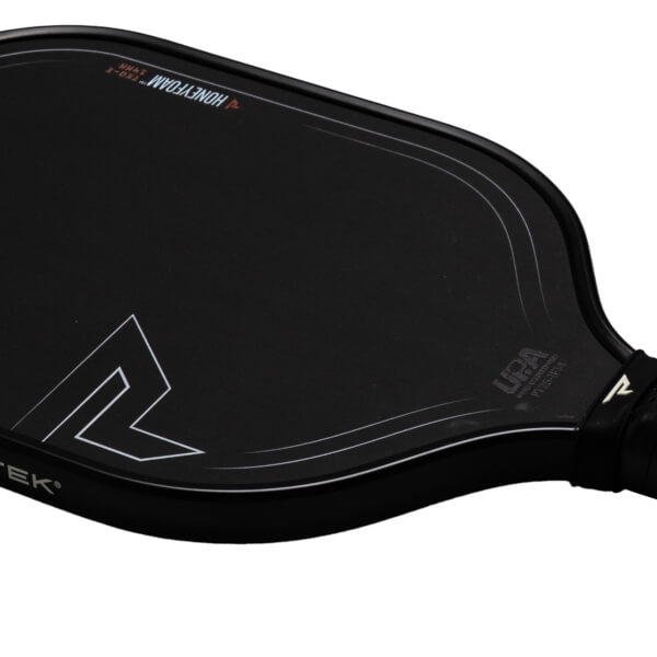 Close-up of a black pickleball paddle showing "HONEYFOAM", "TKO-X", and a white "R" logo.