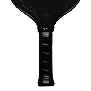 Close-up of a black pickleball paddle handle with a white "P" logo and "USA PRO CERTIFIED PT25-1F14" text.