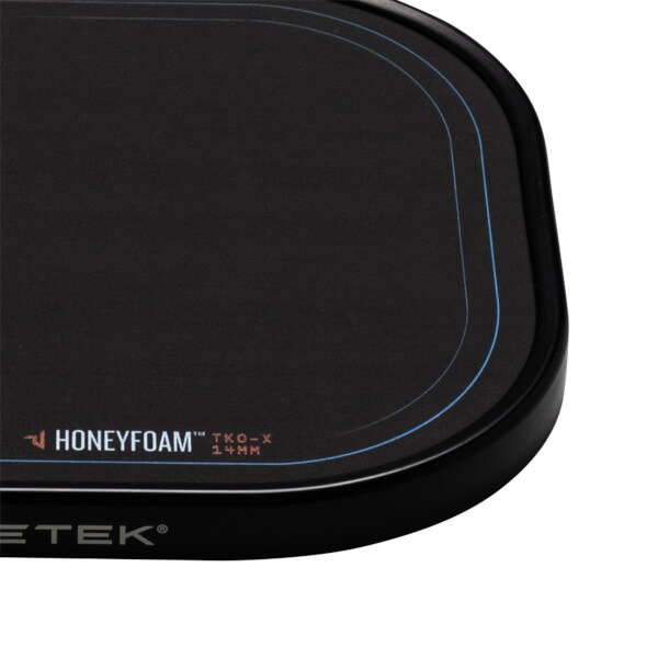 Corner view of a black mousepad with blue accent lines and "HONEYFOAM TKO-X 14MM" text.