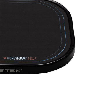 Corner view of a black mousepad with blue accent lines and "HONEYFOAM TKO-X 14MM" text.
