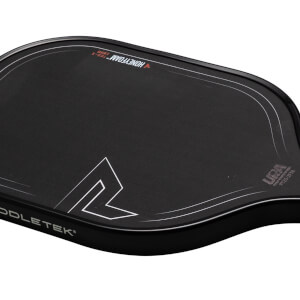 Corner view of a black Paddletek paddle showing the "HONEYFOAM™ TKO-X 16MM" text and a white angular logo.