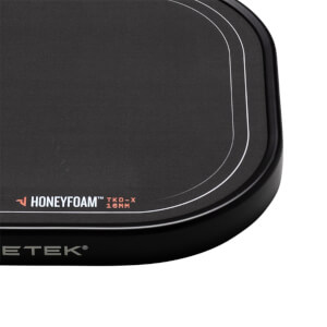 Corner view of the black paddle showing "HONEYFOAM™ TKO-X 16MM" and "PADDLETEK®" text.