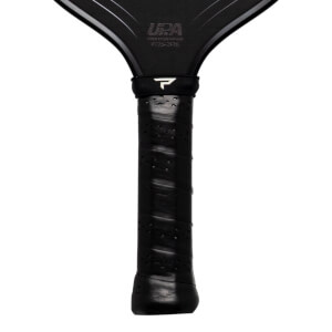 Close-up of the handle and upper neck of a black pickleball paddle, showing the "P" logo and "UAA" text.