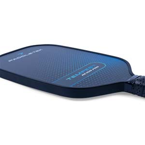 Side view of a blue pickleball paddle with PADDLETEK and TEMPEST REIGN PRO text and a dotted pattern.