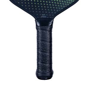 Close-up of a black pickleball paddle grip with USAPA APPROVED text and a patterned face.