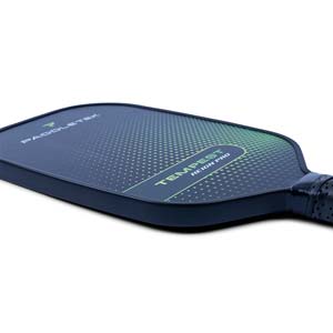 Side view of a dark blue pickleball paddle with a green gradient dot pattern and TEMPEST REIGN PRO text.