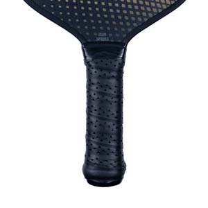 Close-up of a black pickleball paddle grip with perforated texture and USAPA APPROVED text.